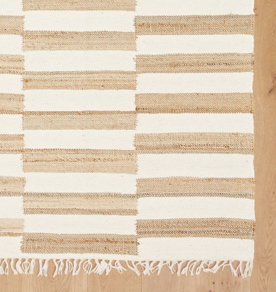 https://qark-images.rjimgs.com/rjimgs/qark/images/dp/wcm/202330/0038/fouts-jute-flatweave-rug-c.jpg